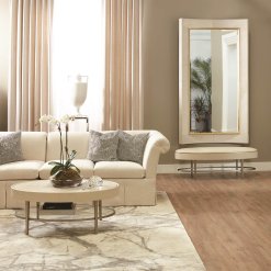 Curved white hair on hide floor mirror lifestyle.
