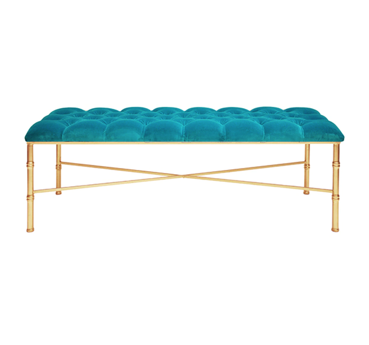 Turquoise velvet bench with gold leaf legs.