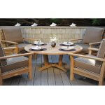 Kingsley Bate Chat table lifestyle with chairs.