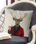 Woodland deer in a red smoking jacket pillow