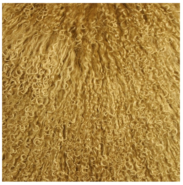 Mongolian lamb fur pillow in Tuscan gold color closeup