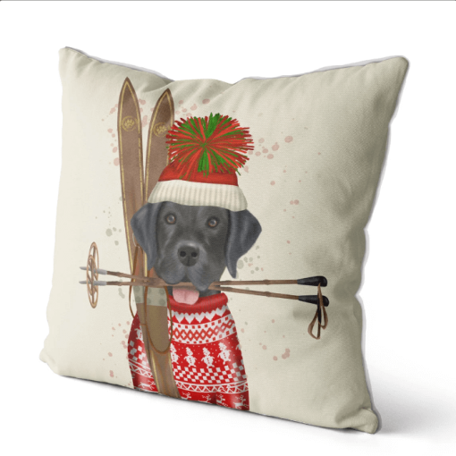 Black Lab is sporting his tasseled Tuke and red ski sweater angled view.