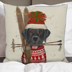 Black Lab is sporting his tasseled Tuke and red ski sweater front view.