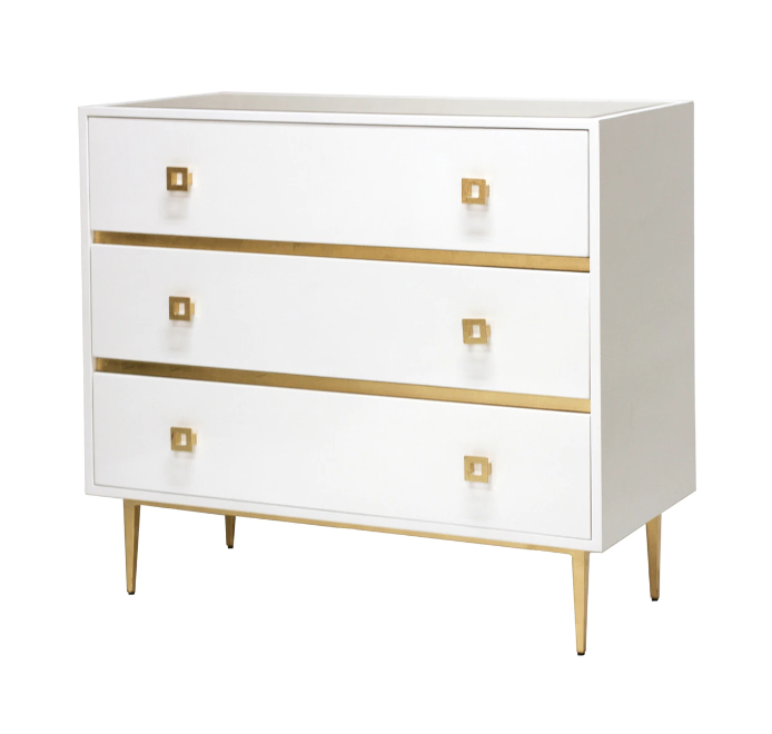 White lacquer chest with gold leaf accents.