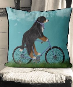 Bernese Dog on bicycle with sky background