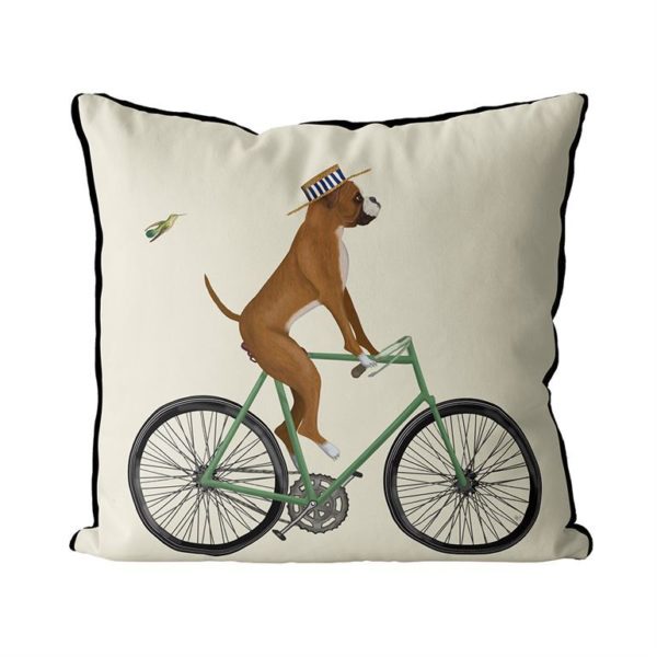 Boxer on bike pillow cream background side