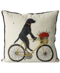 Black Lab on Bike Pillow with cream background front