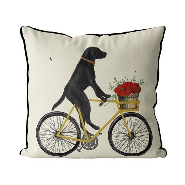 Black Lab on Bike Pillow with cream background front