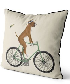 Boxer on bike pillow cream background