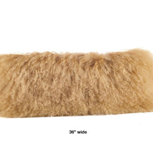 Tuscan colored mongolian fur pillow oblong 36" wide.