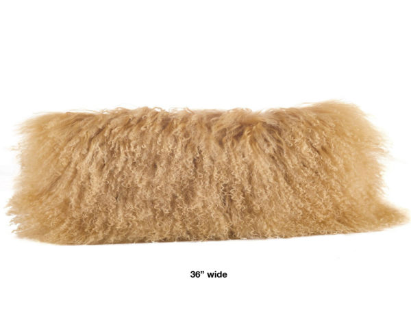 Tuscan colored mongolian fur pillow oblong 36" wide.