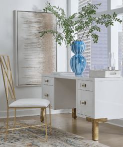 Fresh, white lacquer case floats atop four polished brass legs. Shown sitting in front of a city window.