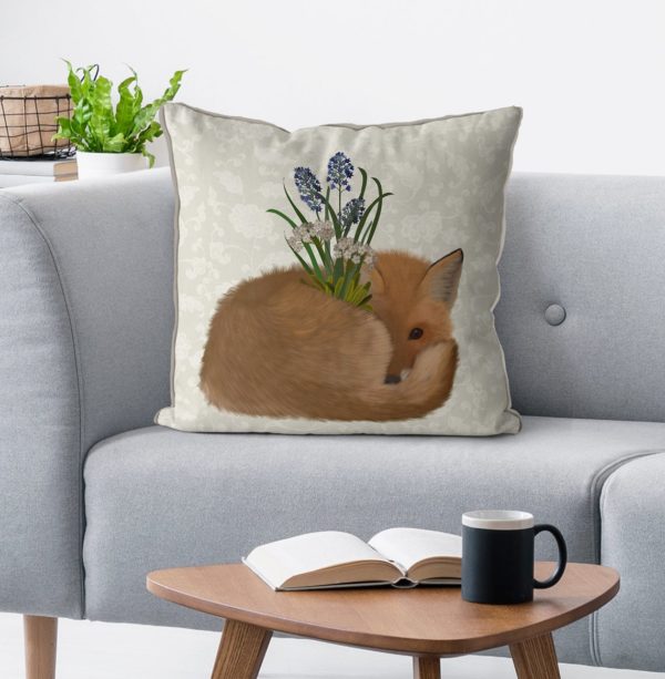 Sleepy Fox pillow on the sofa