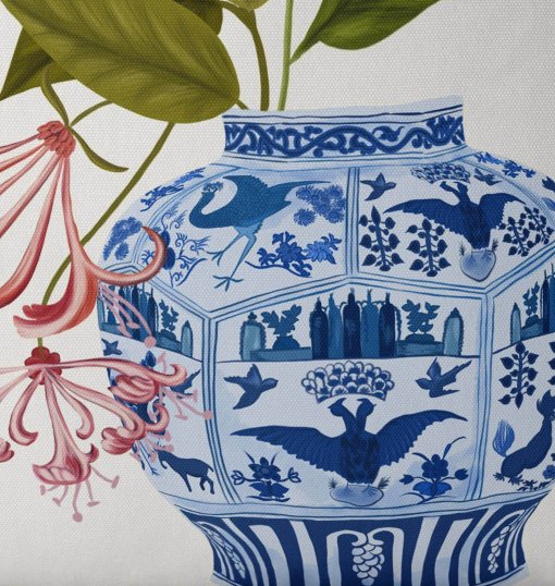 Pillow with Chinchona Vase w red flower design, closeup view.