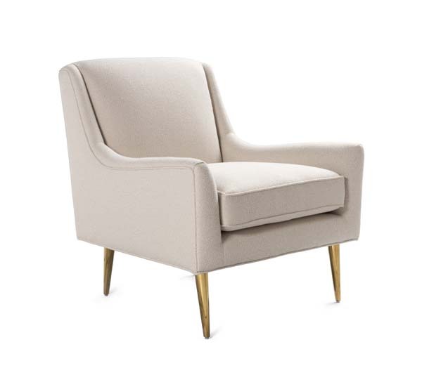 Wrenn Ivory lounge chair with brass legs angled front view.