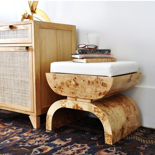 Burl wood bench with ivory linen upholstery lifestyle view.