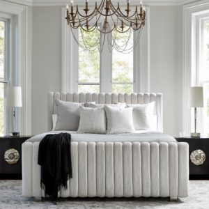 Soft white Silhouette upholstered channeled bed.