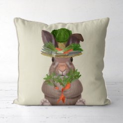 Pillow with Bunny wearing a hat with garden tools.