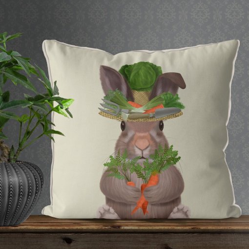 Pillow with Bunny wearing a hat with garden tools.