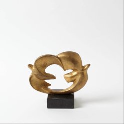 2 doves connected by their wings that forms a circle. Gold leaf finish sits on black granite base.