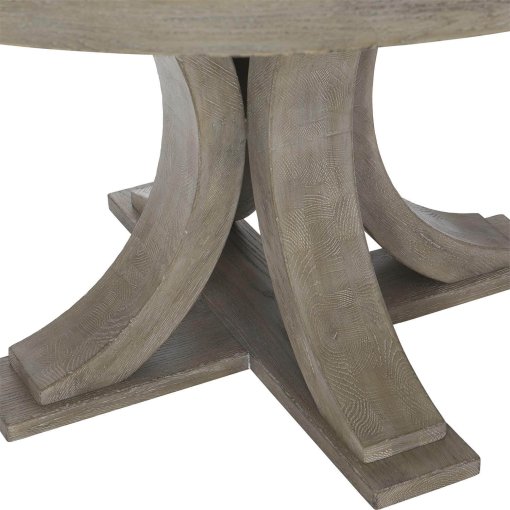 Albion white oak round dining table four curved legs closeup.