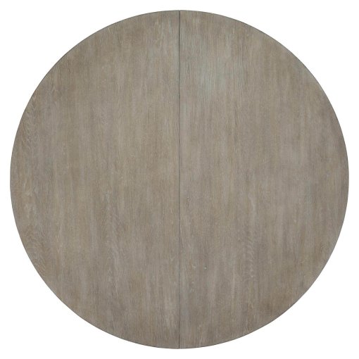 White oak round dining table top view.