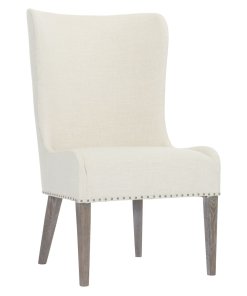 Albion upholstered wingback chair, with exposed legs.