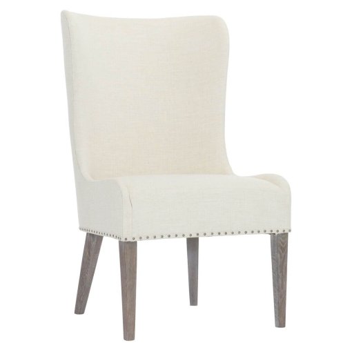 Albion upholstered wingback chair, with exposed legs.
