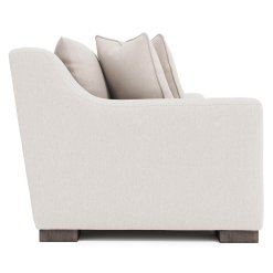 Gabi sofa shown in ivory upholstery, side view.