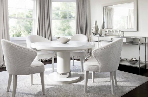 Silhouette arm chair around dining table.