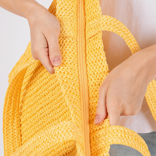 Crochet Straw Tote in Yellow closeup of zipper.