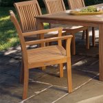 Chelsea Teak lifestyle arm dining chair side.