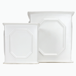 2 White Ceramic geometric planters, front view