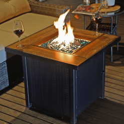 30" Gas Fire pit with table top at night lifestyle.