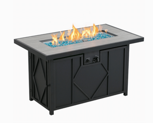 42" Gas Fire pit lit with blue fire glass angled view.