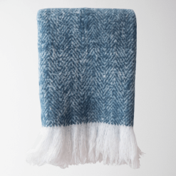 Ella herringbone brushed throw in blue.