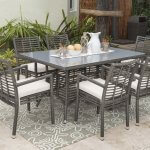 Panama Jack 7 piece dining set with Arm chairs lifestyle.