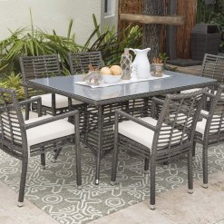 Panama Jack 7 piece dining set with Arm chairs lifestyle.