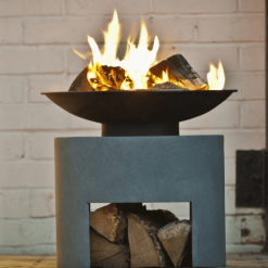 16" Oval Steel fire bowl lit lifestyle front view