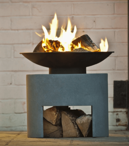 16" Oval Steel fire bowl lit lifestyle front view