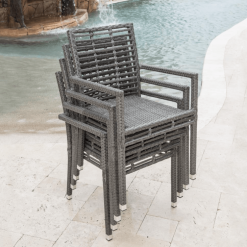 Graphite dining arm chair shown stackable.