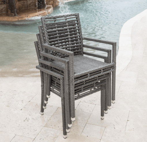 Graphite dining arm chair shown stackable.
