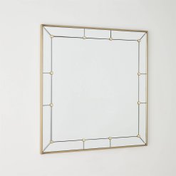 Brass studded mirror angled view