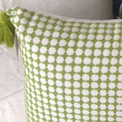 Green woven pillow closeup