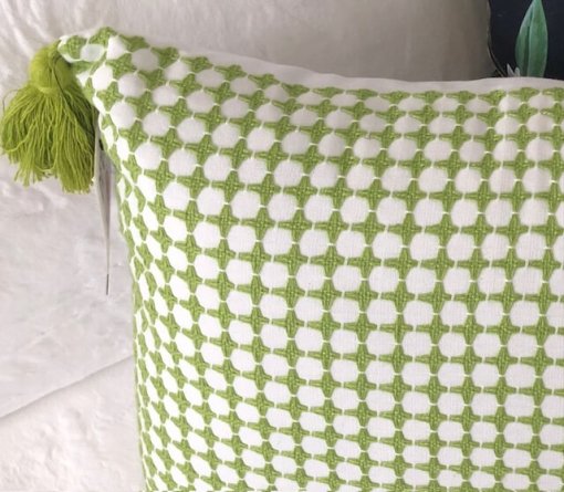 Green woven pillow closeup