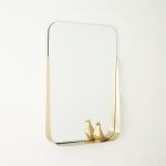 Rectangular mirror with brushed brass shelf.